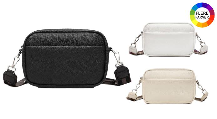 Deal på Stilfuld håndtaske, der kan bæres som crossbody eller skuldertaske