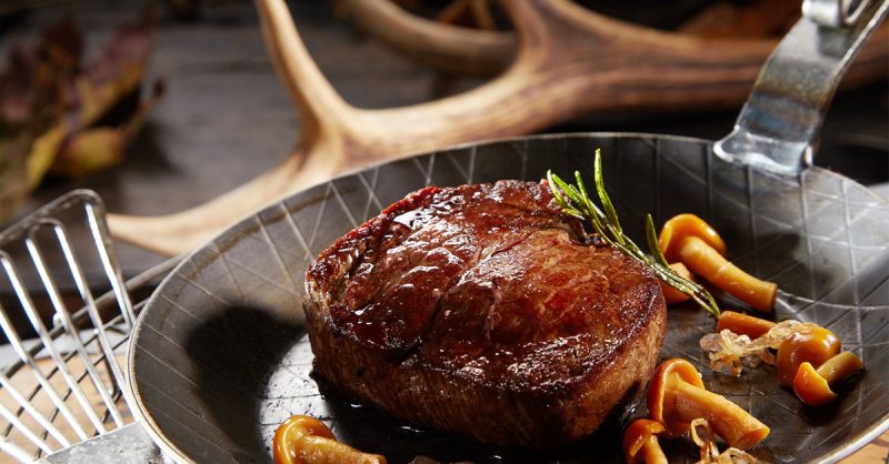 Steak Night for Two or Four at The Woodlands with Wine or Peroni