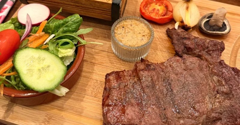 Rib-Eye Steak with Chips and Salad at Cactus Grill Bar Restaurant