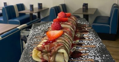 Delicious Crepes, Waffles, Burritos, or Sundaes at Mr Spice and Krepes n Kones