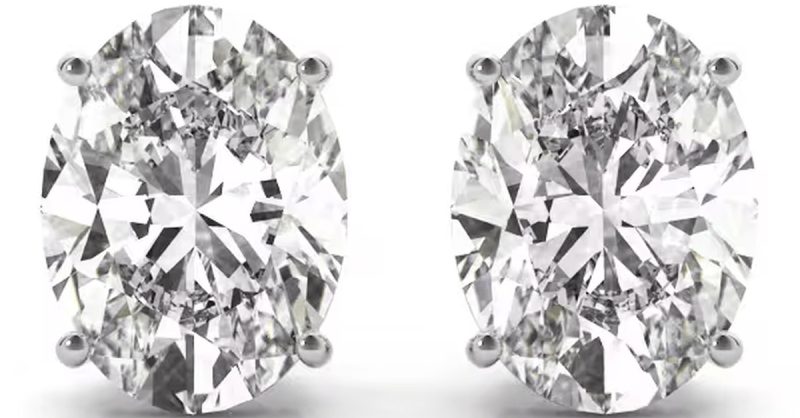 Elegant 0.50ct Oval Cut Diamond Stud Earrings at Sunshine Diamonds